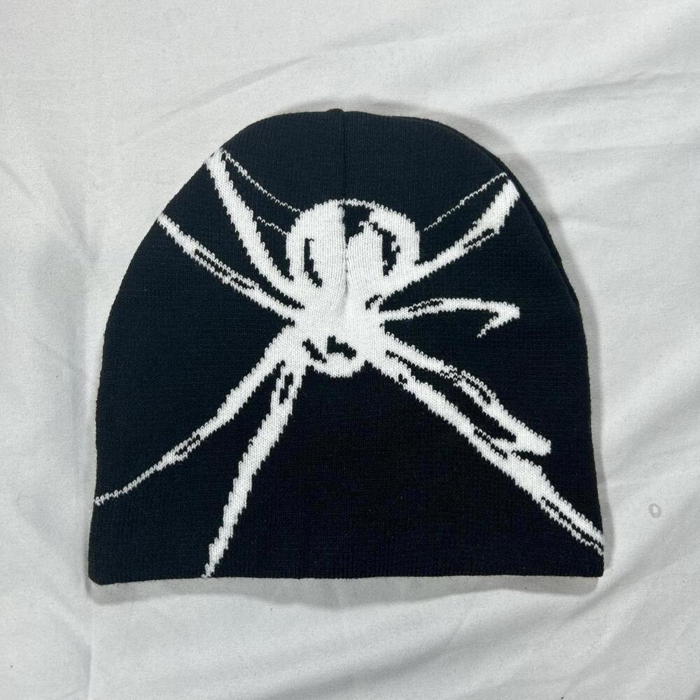 Black and white spider beanie made with 100% Acrylic